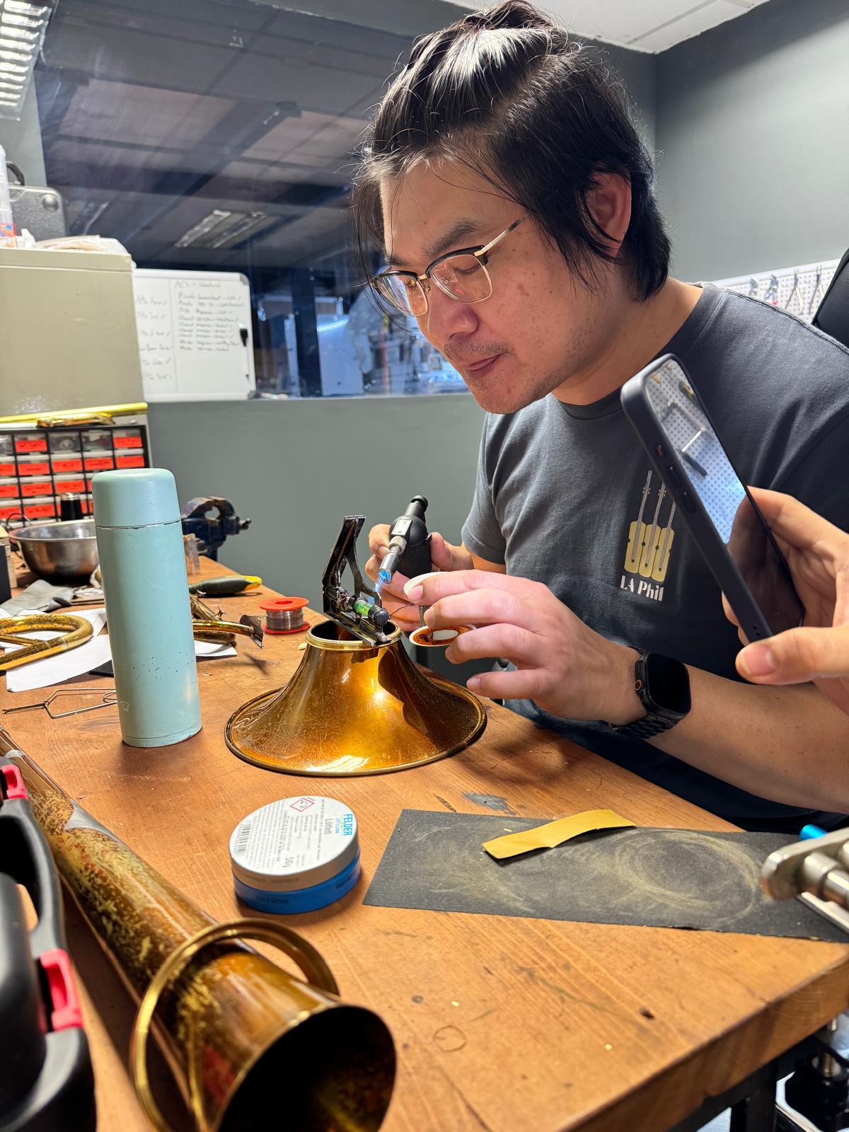 Precision soldering work at the repair bench